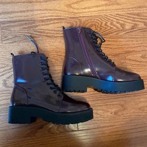 Deep burgundy combat boots.